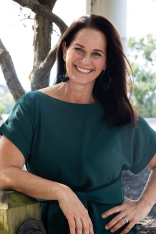 Mayor Amy Goodwin in a blue dress