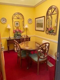 Image of Dunbar study room, complete with a table, four chairs, and other furnishings.